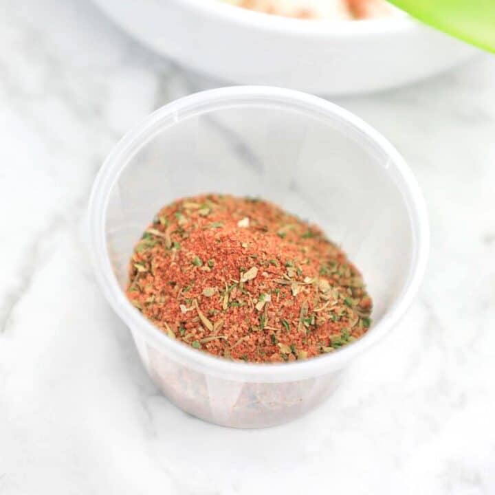 chicken breast seasoning in a plastic container.