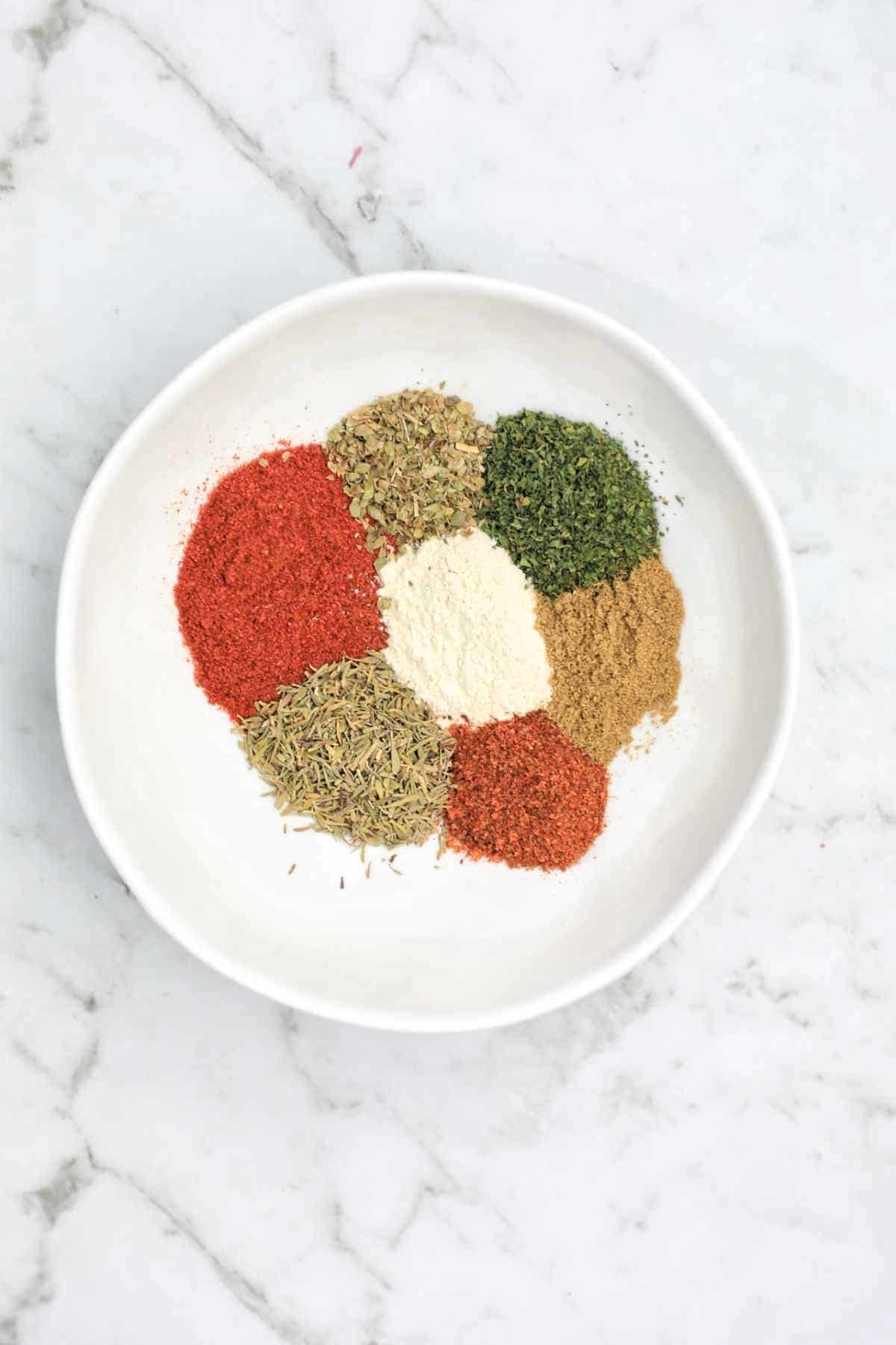 herbs and spices in a small bowl.
