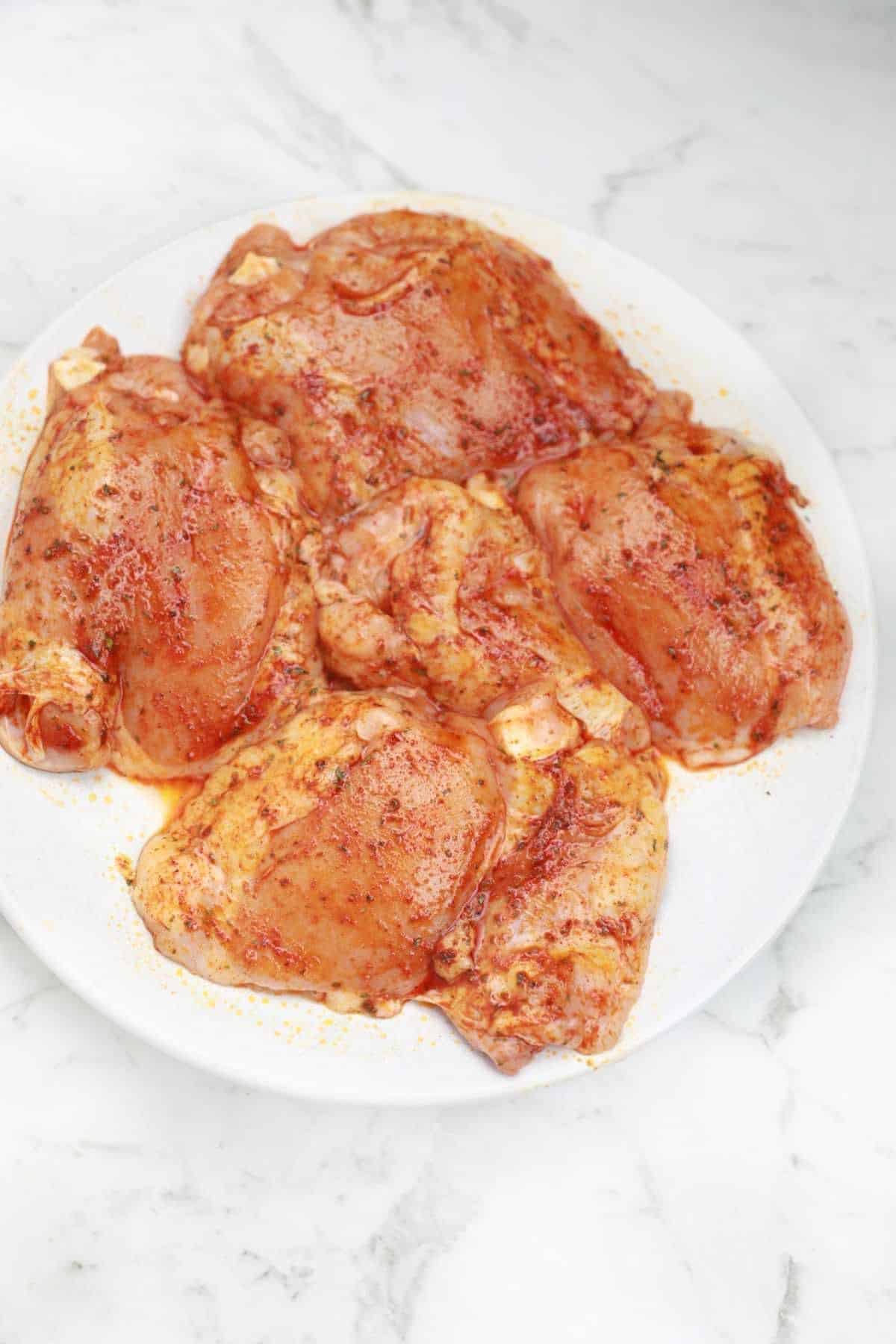 marinated thighs on a plate.