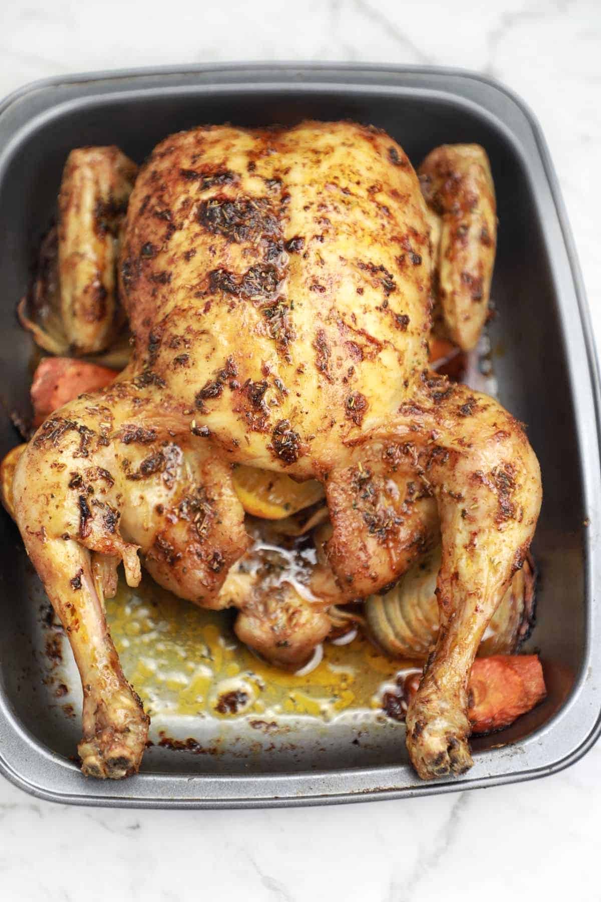 christmas chicken in a roasting dish.
