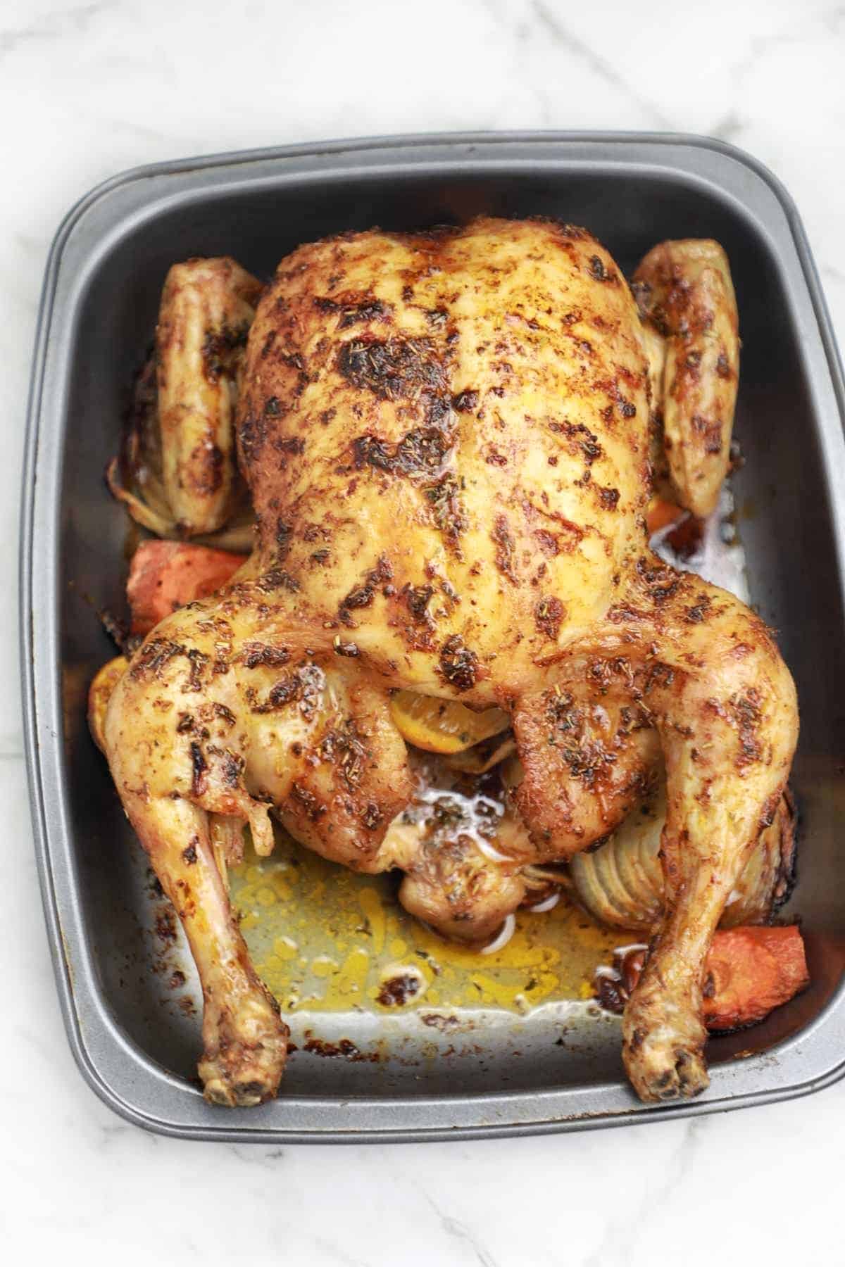 roast christmas chicken in a baking tray.