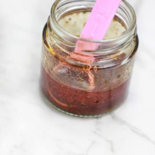 the chicken wings marinade in a jar.
