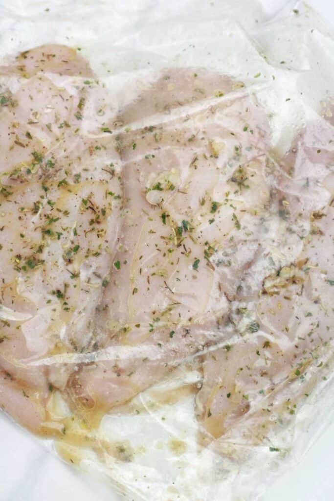 marinated chicken breasts inside Ziploc.