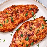air fryer bbq chicken breast served on a plate.