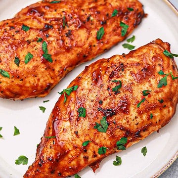 air fryer bbq chicken breast served on a plate.